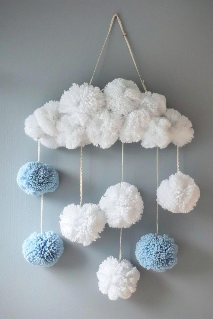 8 Simple Home Aesthetic DIYs for a Personalized Touch (Your Home Will Thank You!) - 8. Whimsical Pom-Pom Cloud Decor